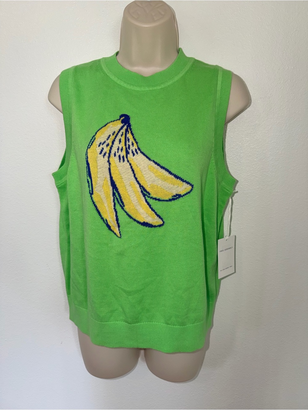 Bright Green Sleeveless Knit Tank with Playful Banana Graphic